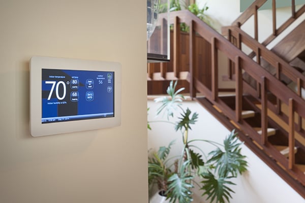 smart thermostat on a wall