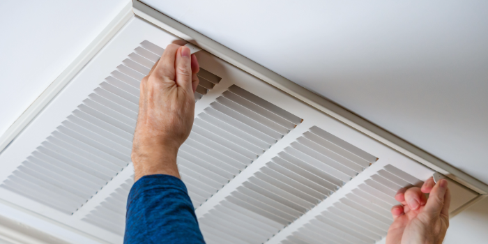 Man changing air filter