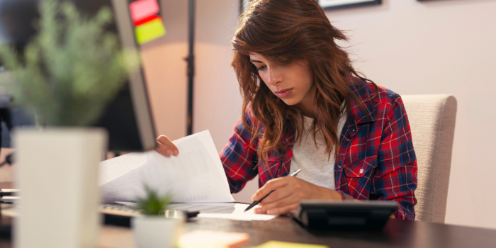 woman reviewing her bill